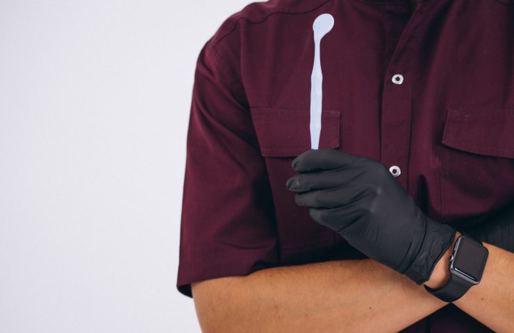 dentist with dentistry tools isolated